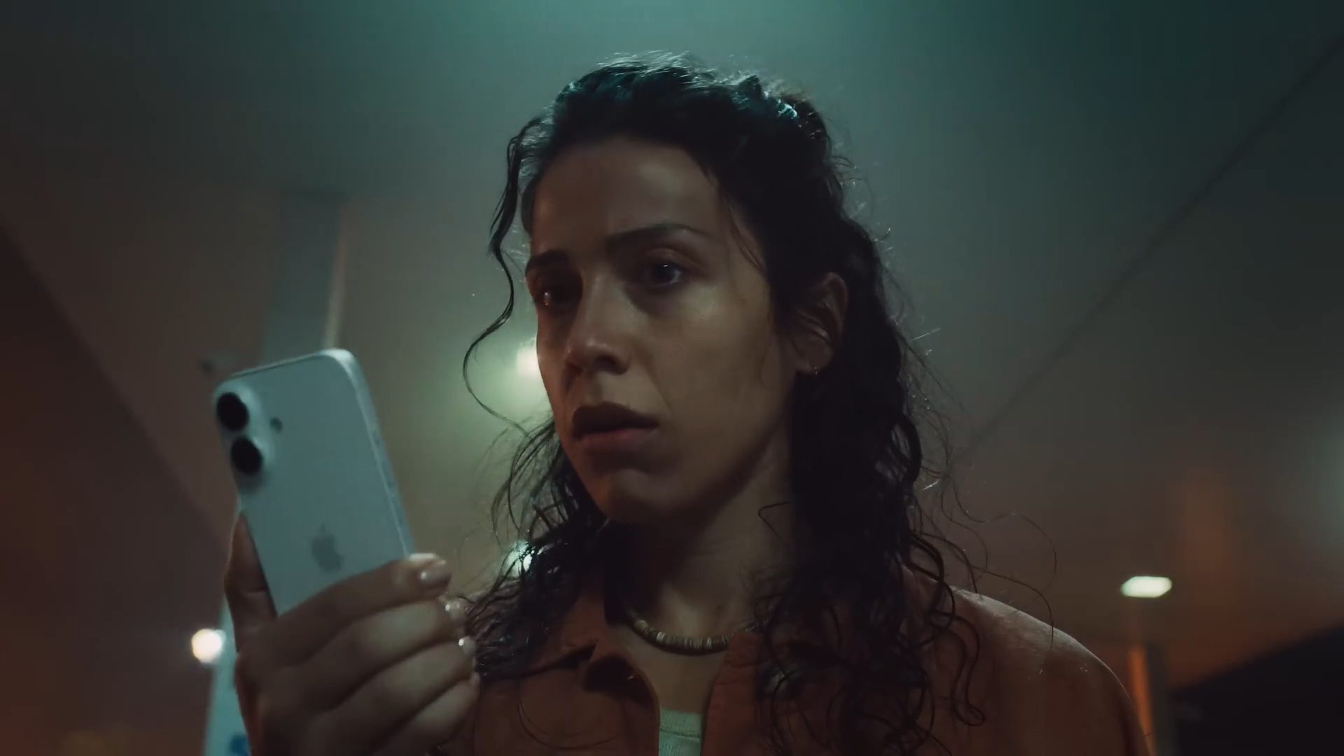 Apple Pay Outrun ad frame showing the payment moment analyzed by AdLens