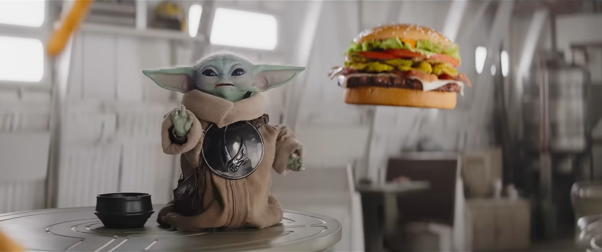 Grogu moving Burger King menu items in the crossover ad analyzed by AdLens